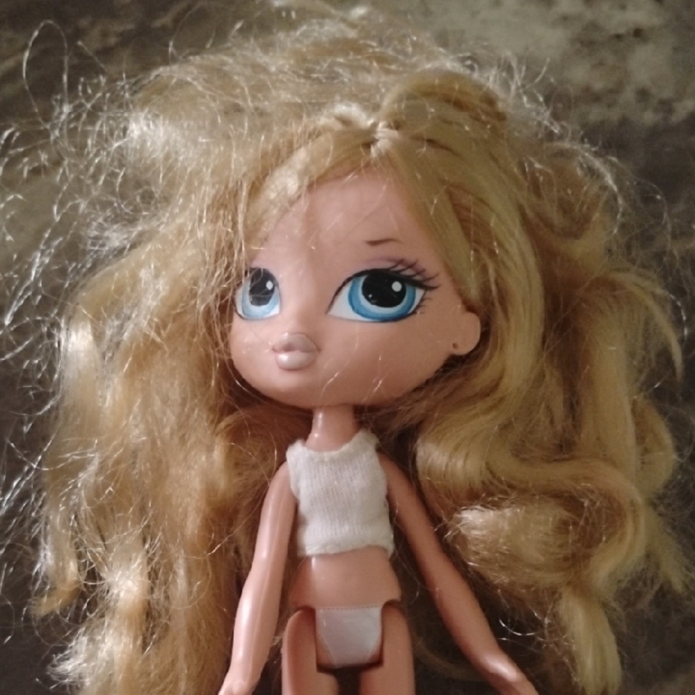 Stylish Blonde Doll with Blue Eyes